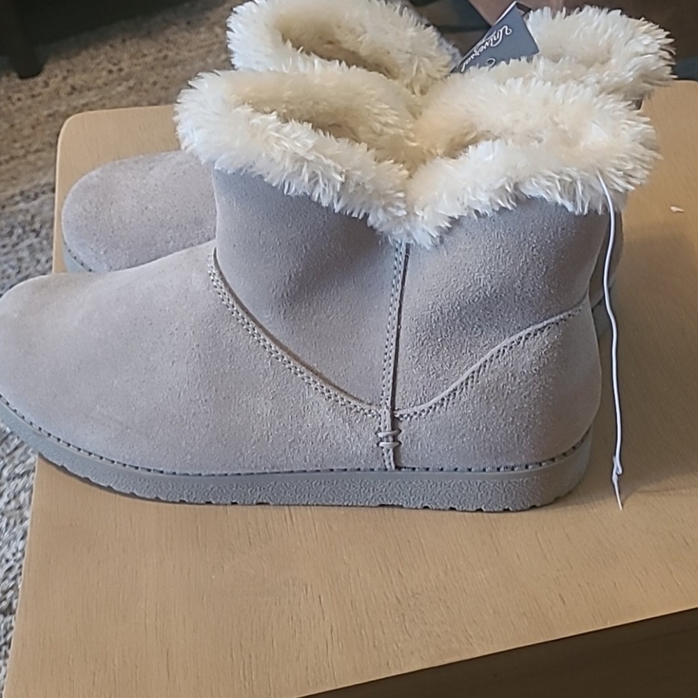 Gray and cream boots